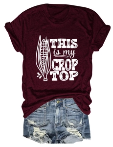 Burgundy t-shirt featuring 'THIS IS MY CROP TOP' graphic and distressed denim shorts