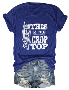 Close-up of THIS IS MY CROP TOP print on blue t-shirt with distressed denim shorts