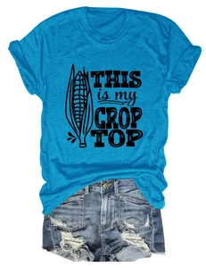 Flat lay of blue cotton T-shirt with corn print and distressed denim shorts detail