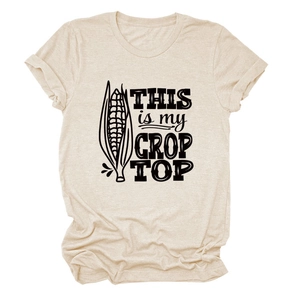 Detail of crew neck ribbing and This Is My Crop Top print on beige cotton t-shirt