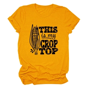 Detailed flat lay of a bright yellow t-shirt with corn graphic and crop top pun print