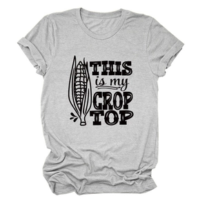 Detail of crop top print with corn graphic and text on heather grey cotton fabric