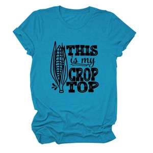Detailed flat lay of tiffany blue crop top featuring black graphic print and crew neck