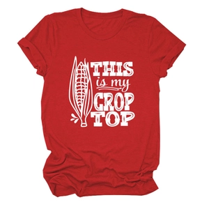 Detail of red t-shirt fabric featuring white THIS IS MY CROP TOP print with corn pun
