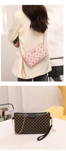 Detail of crossbody bag featuring metallic chain, leather strap and circle print pattern