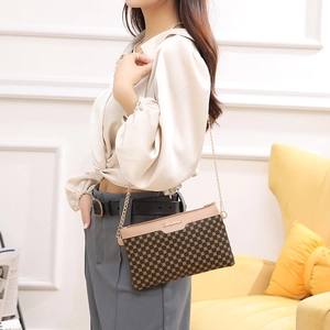 Borsa a tracolla vintage da donna con stampa, logo S dorato e chiusura a zip