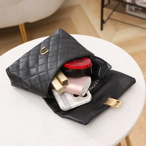 Quilted black chain crossbody bag for women showing interior space and daily essentials