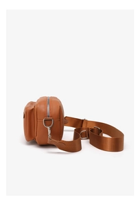 Detail view of brown PU leather crossbody bag featuring silver zippers and adjustable strap