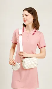 White crossbody camera bag with detachable round coin purse and wide strap detail