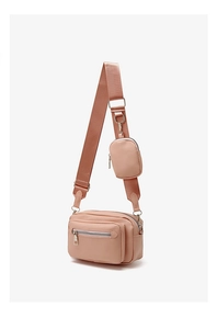 Detail of dusty pink crossbody bag set with wide woven strap and mini coin purse pouch