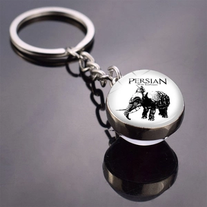 Macro detail of Roman Empire style glass dome keychain showing Persian War Elephant design