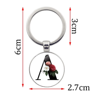 Porte-clés lettre A de 6cm avec pendentif en verre motif fleurs et anneau argenté