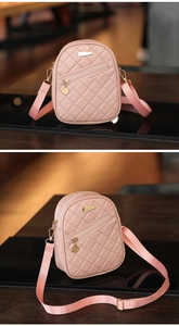 Detailed view of pink quilted PU leather mini crossbody bag with gold-tone hardware