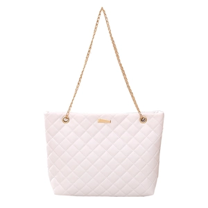 Elegant beige quilted bucket bag with gold chain strap and metallic detail for women