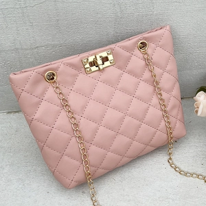 Pink quilted shoulder bag with gold chain strap and elegant metallic rotary lock