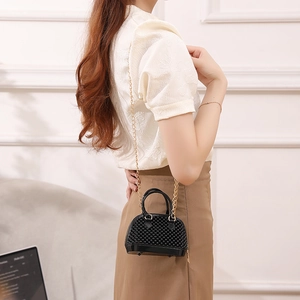 Fashionable black shell bag with 3D bead texture and golden chain shoulder strap