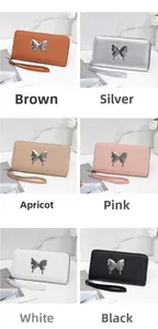 Variety of zip long wallets featuring metallic butterfly decor and wrist straps in six colors