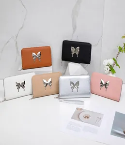 Six colors of long zip wallets for women with butterfly metal charms and wristlets