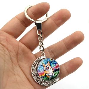 Van Gogh starry night style rotating keychain with Corgi dog art and crescent moon frame