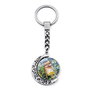Rotating keychain with sunflower golden retriever art and hollow silver moon pendant