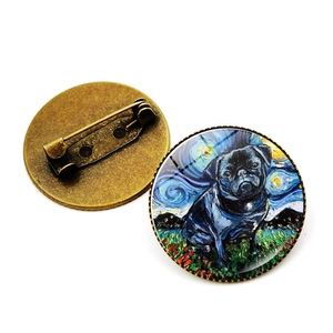 Close-up of Van Gogh Starry Night style Corgi brooch showing front glass and back bronze pin