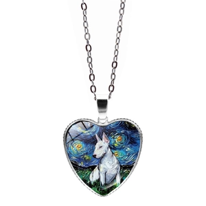 Detail of heart pendant with Van Gogh style Starry Night painting and a white bull terrier