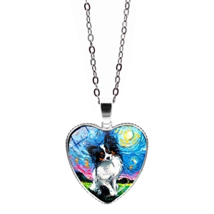 Detailed view of heart pendant featuring Van Gogh starry night art with a Papillon dog