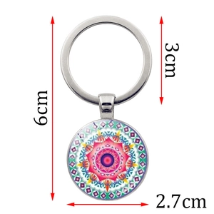 Mandala Schlüsselanhänger mit geometrischem Muster, Glaskuppel und silbernem Metallring