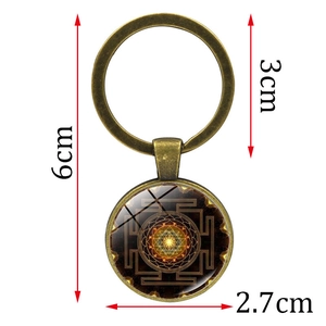 Sri Lanka Mandala Time Gem keychain with antique bronze finish and glass dome pendant