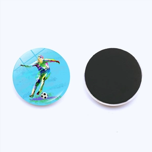 Detailed front and back view of crystal glass soccer player fridge magnet with strong back magnet