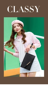 Dettaglio di pochette a busta nera minimalista con elegante inserto in metallo oro