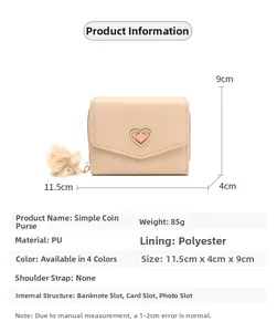 Detailed view of beige PU leather wallet with pink heart buckle and plush charm detail