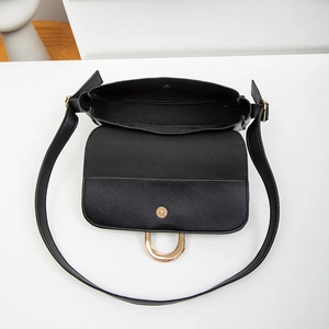 Black textured leather shoulder bag with gold metal U-shaped buckle and long strap