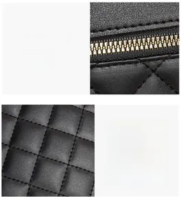 Detail of black quilted leather bag showing tight stitching and golden metal zipper