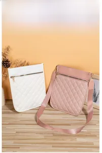 Close-up of quilted pattern and metal zipper on these stylish crossbody phone bags