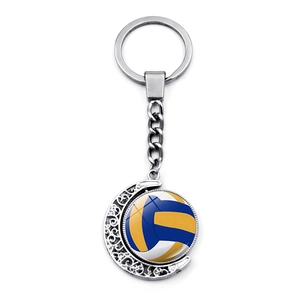 Spinning volleyball keychain with silver crescent frame and rotatable glass pendant charm