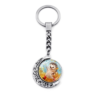 Rotating hedgehog keychain with crescent moon pendant and cute violin illustration