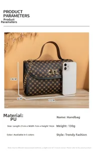 Quilted crossbody bag dimensions 21x7x14cm shown with smartphone for size comparison