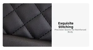 Close-up of black quilted leather backpack with precise stitching and diamond texture