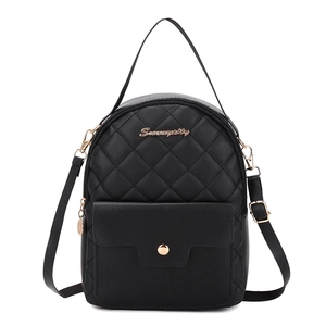 Compact black quilted backpack with gold hardware and versatile convertible straps