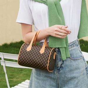 Classic checkered Boston barrel handbag with brown vintage pattern and leather handles