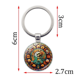 Halloween ghost skull keychain with golden skull pendant and 12 mystical symbols