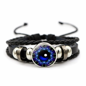 Detail of multi-layer braided leather bracelet with blue Evil Eye glass charm and beads