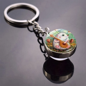 Detailed view of hedgehog cartoon illustration inside a glass dome keychain accessory