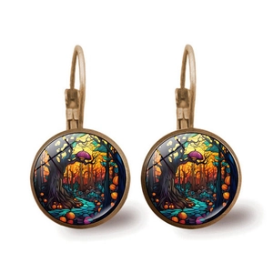 Retro gold Halloween earrings featuring a whimsical pumpkin forest illustration