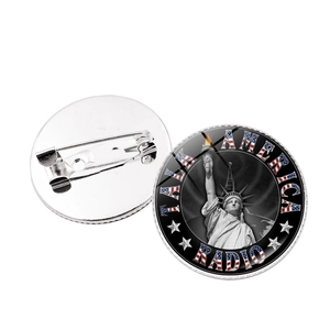 Detail of Statue of Liberty metal badge with Talk America Radio logo and safety pin