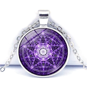 Detailed view of mystical purple sacred geometry pendant with silver chain and glass dome