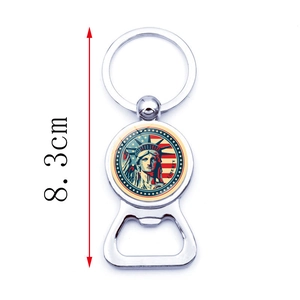 Detail view of Statue of Liberty beer bottle opener keychain with dimensions 8.3cm