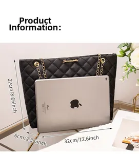 Quilted black tote bag showing spacious capacity compared to a tablet and gold chain strap