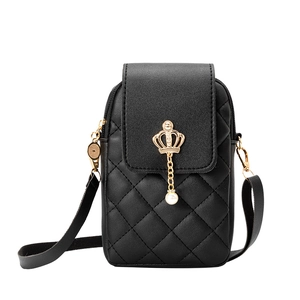 Mini black quilted phone crossbody bag with gold crown pendant and pearl detail